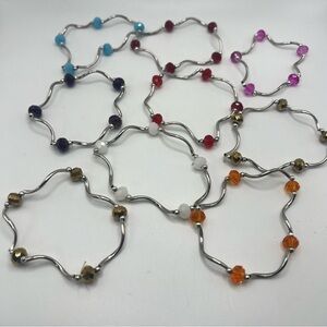 Set of 9 Silver Toned Colorful Bead Wavy Tube Bracelets